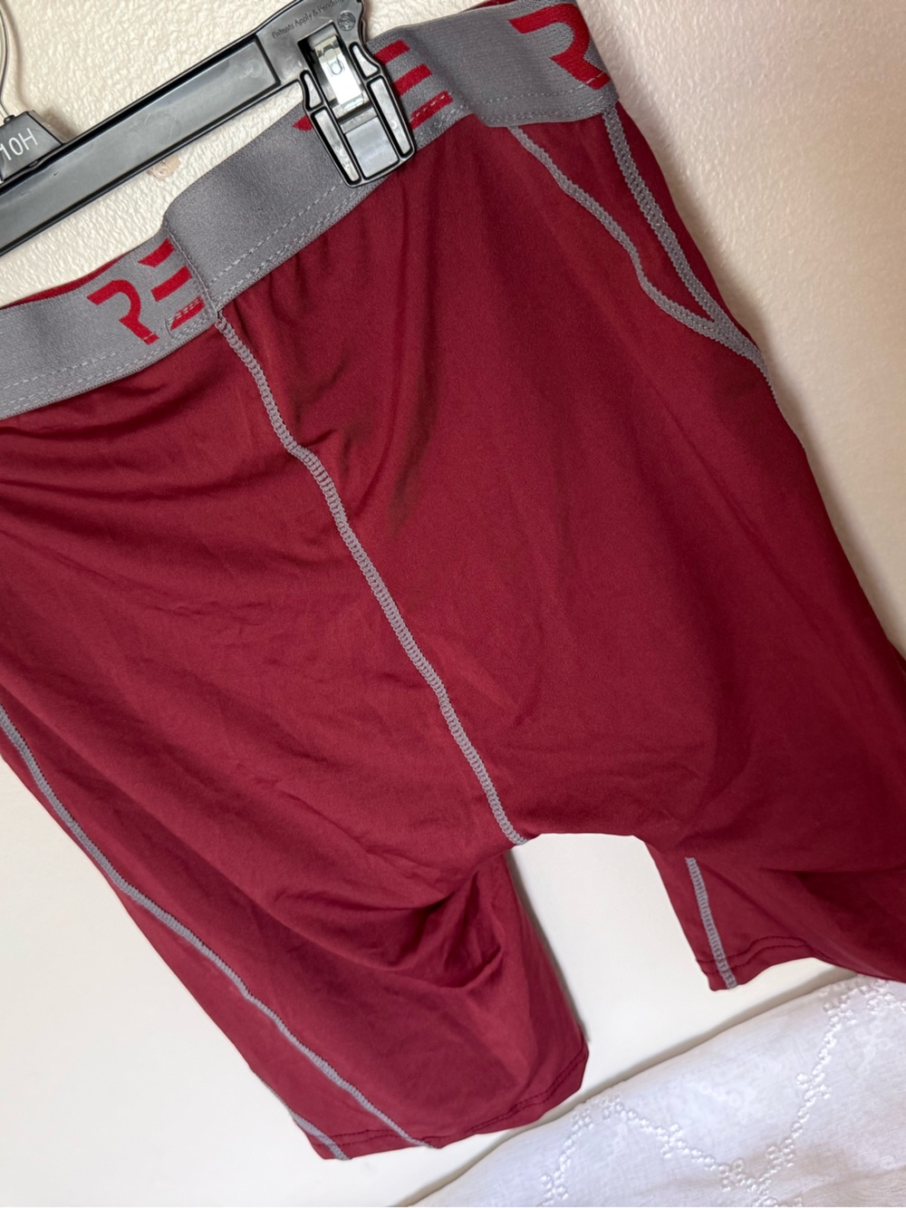 Essentials Men's Maroon Athletic Compression Shorts with Gray Waistband